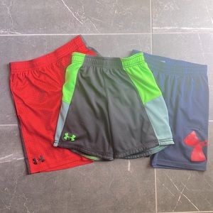 Lot of 3 pairs Under Armour shorts size 7. Green shorts are reversible.